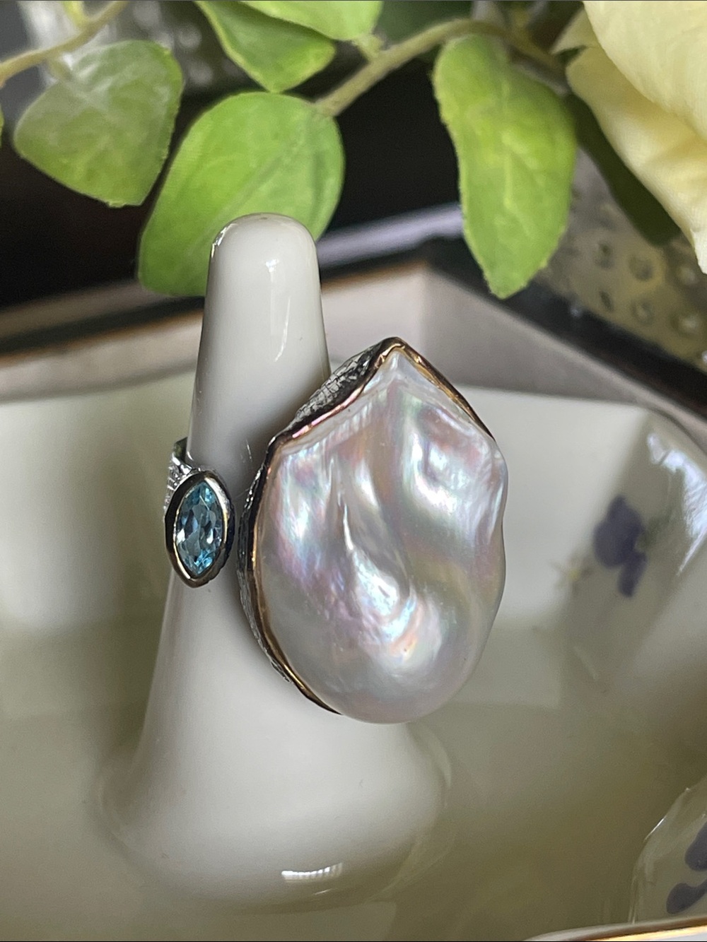 Big 925 Silver Ring with mother of Pearl looking stone and Blue marquis stone.